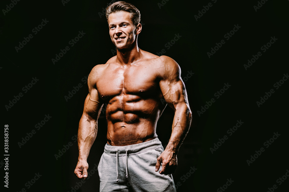 Fototapeta premium muscular attractive man in gym