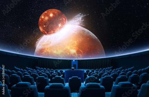 Spectacular digital projection at planetarium with empty seats 