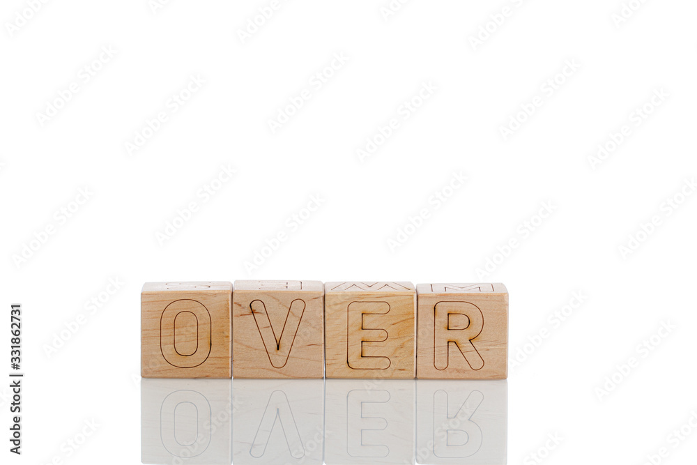 Fototapeta premium Wooden cubes with letters over on a white background