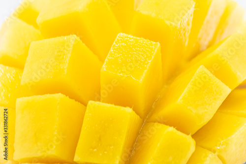 Yellow  mango slice with  isolated white background