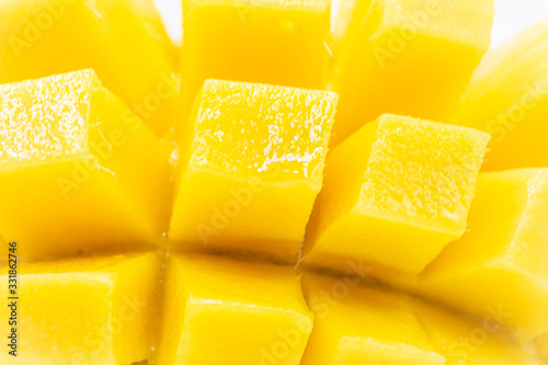 Yellow  mango slice with  isolated white background