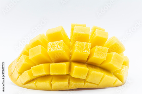 Yellow  mango slice with  isolated white background