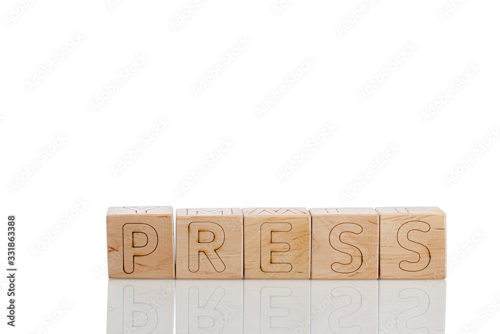 Wooden cubes with letters press on a white background