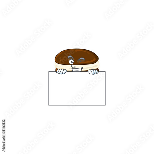 Cheerful whoopie pies cartoon character has a board photo