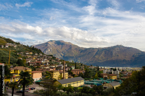 Mountain view over small industrial Italian village called Gavazzo near Lake Garda.