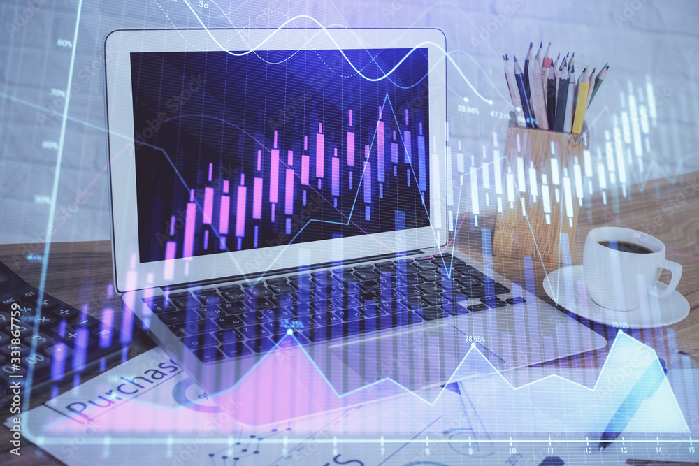 Forex market chart hologram and personal computer background. Double exposure. Concept of investment.