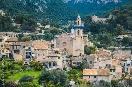 The village of Valldemossa with the parish church of sant bartomeu, Mallorca, Spain © Joppi