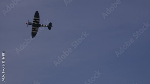 Spitfire plane WW2 in the sky flying through sky UK 4K