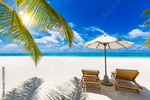 Luxury vacation  summer vibes. Tranquil beach scene. Exotic tropical beach landscape for background or wallpaper. Design of summer vacation holiday concept. Exotic travel destination