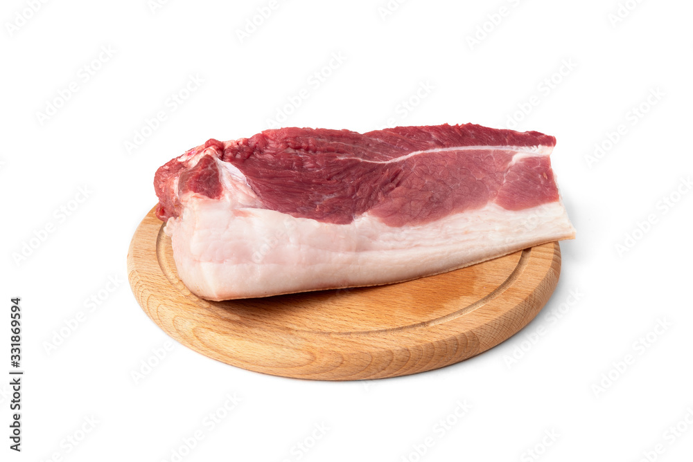 Raw pork shoulder meat on wooden board isolated on white background. Raw pork shoulder meat on wooden board isolated on white background.