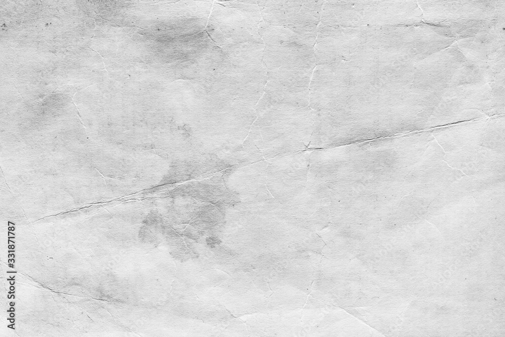 Naklejka premium Cardboard white texture close-up. Light old paper background. Grunge concrete wall. Vintage blank wallpaper.
