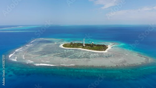 Aerial drone shot of Amédée Lighthouse Island in New Caledonia. photo