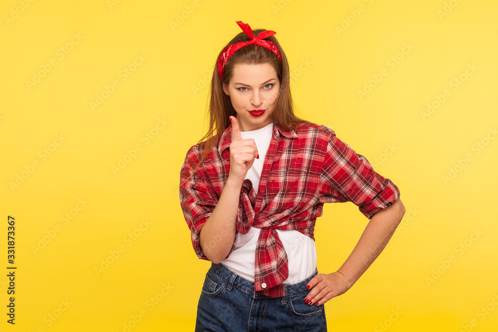 I told you! Portrait of strict pinup girl in checkered shirt and headband teaching with admonishing gesture, warning I told you! Portrait of strict pinup girl in checkered shirt and headband teaching with admonishing gesture, warning