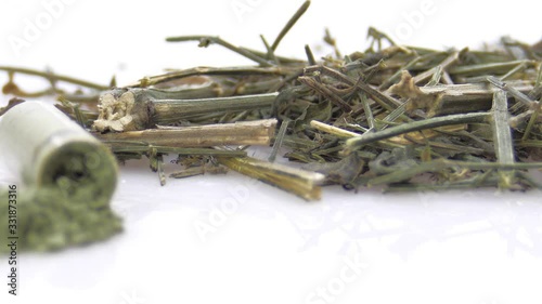 Fa thalai chon, kariyat herb antiviral activity (Andrographis Paniculata) Capsules on a white background. photo