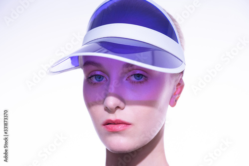 Blonde girl in sports visor - sun protection
