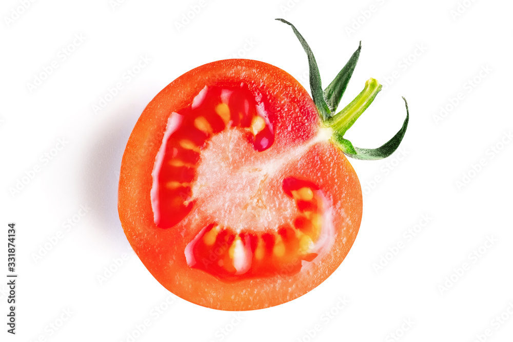 Half of fresh, red tomato with green leaves isolated on white background. Clipping path. Half of fresh, red tomato with green leaves isolated on white background. Clipping path.
