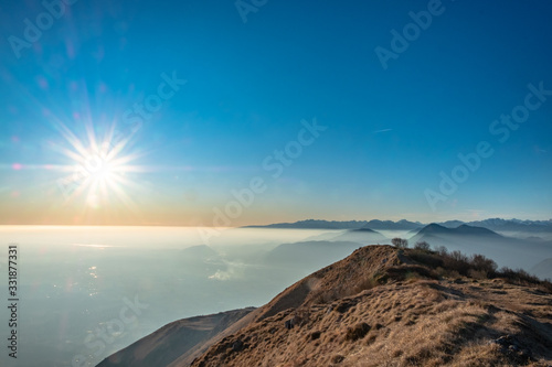 Winter sunset from an alpine peak of Friuli-Venezia Giulia