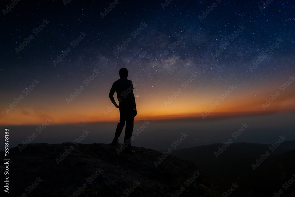 Landscape with Milky Way. Night sky with stars and silhouette of a standing happy man on the mountain,Outer Space, Star - Space, Milky Way, Night, Mountain Climbing