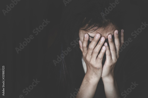 Tela grunge image of a beautiful teenage girl sitting on the floor crying, Stop sexu
