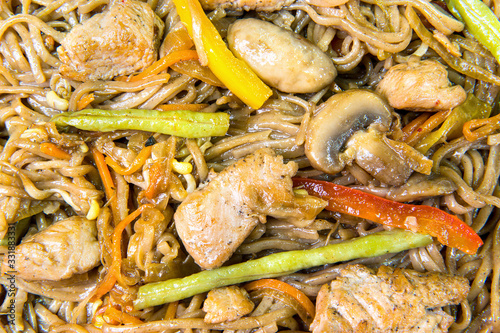 Spice fried noodles with colored peppers and sliced pork