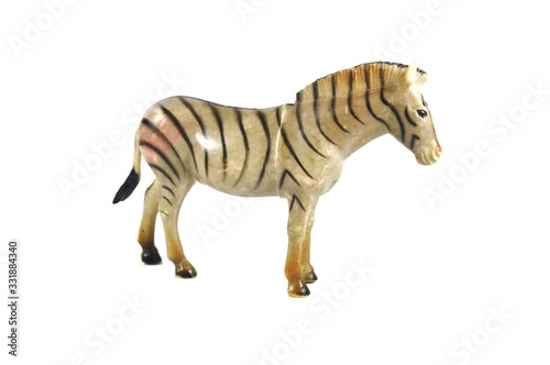 Image of a zebra toy isolated on white background © nazarudin