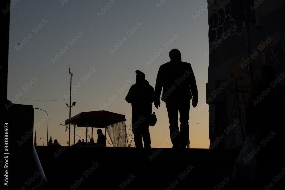 silhouettes at sunset in Istanbul, Turkey
