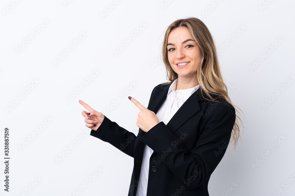 Young business woman over isolated white background pointing finger to the side Young business woman over isolated white background pointing finger to the side