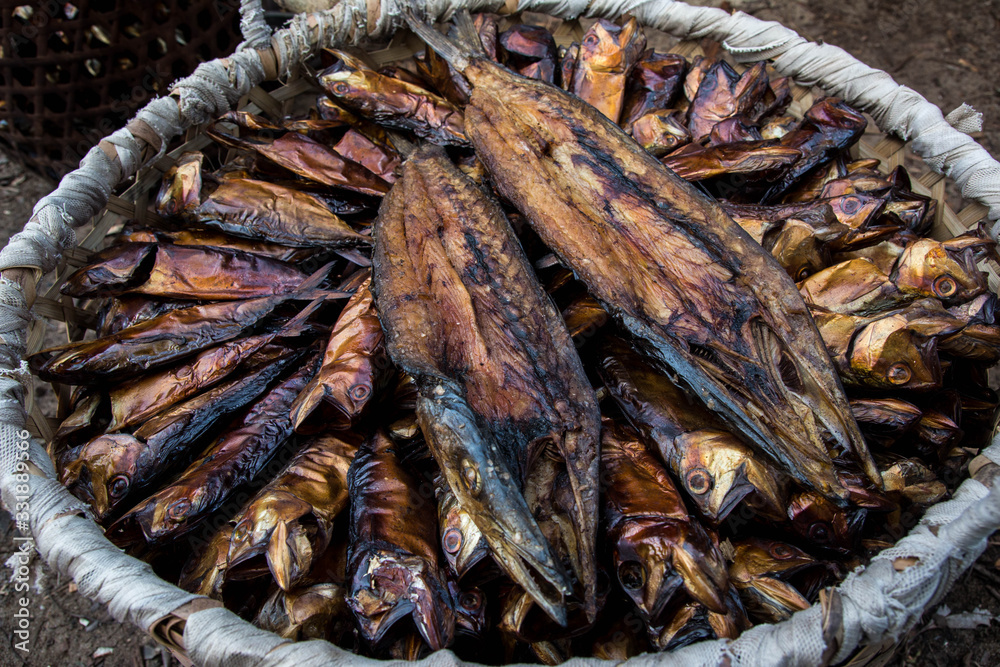 close up of basket with grilled dried fish in masoala madagascar