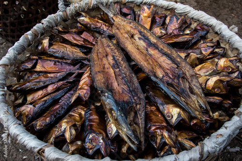 close up of basket with grilled dried fish in masoala madagascar photo