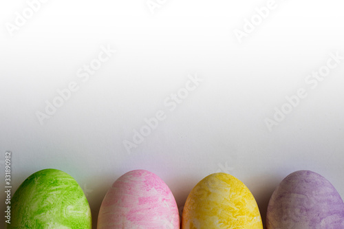 colored easter eggs on a white background