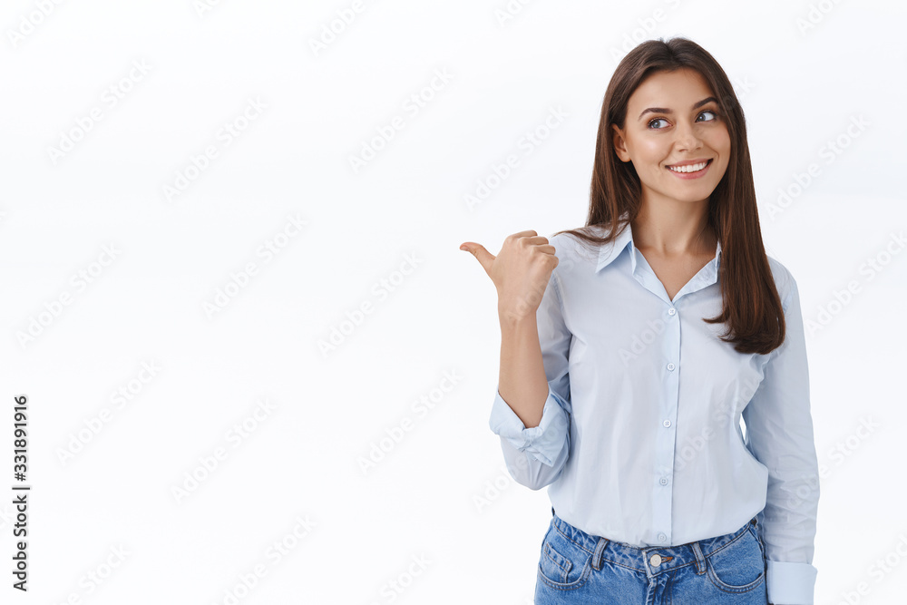 Dreamy and pleased young attractive woman found exactly what need, look and pointing left satisfied with delighted happy smile observe something cool, recommend product, white background Dreamy and pleased young attractive woman found exactly what need, look and pointing left satisfied with delighted happy smile observe something cool, recommend product, white background
