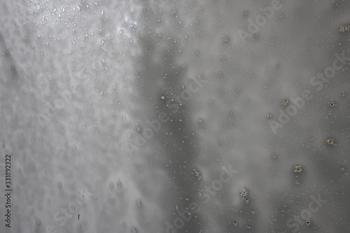  white background of soapy foam with water droplets
