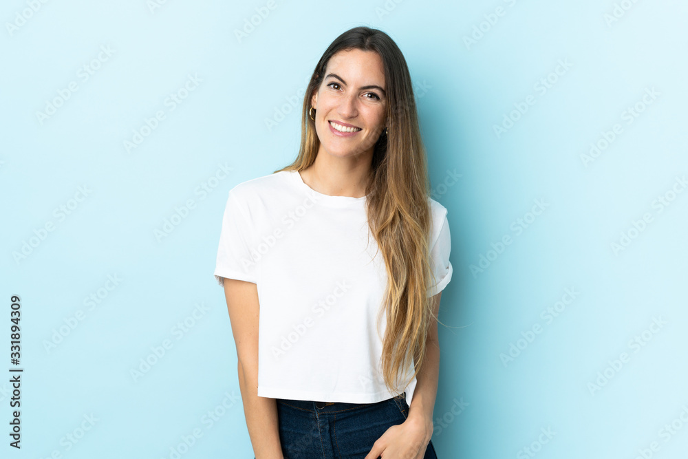Young caucasian woman over isolated background laughing Young caucasian woman over isolated background laughing