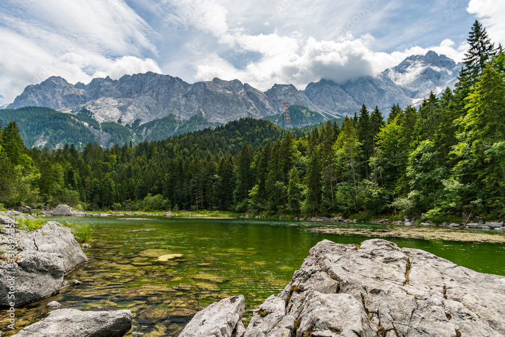 Fototapeta premium Fantastic round hike around the beautiful Eibsee at the Tiroler Zugspitze Arena