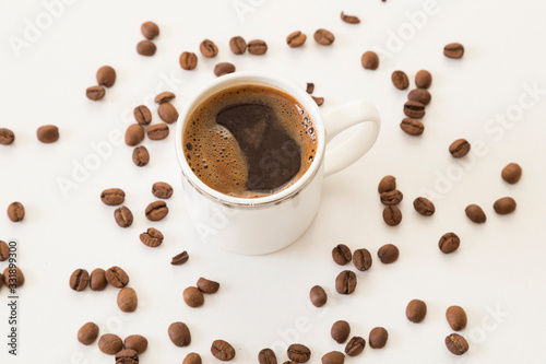 A cup of coffee bean concept on the white background.