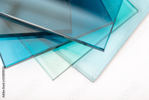 Sheets of Factory manufacturing tempered clear float glass panels cut to size photo