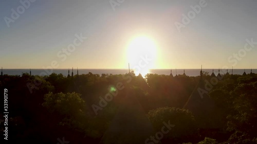 Aerial drone footage of the western part of New Caledonia. The bay of Poé, The great blue lagoon. Typical houses for tourists in a luxury resort.