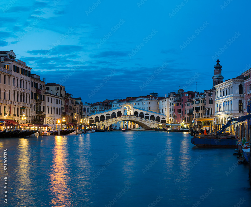 Night view of The Rialto Bridge on the Grand Canal in Venice,Italy.