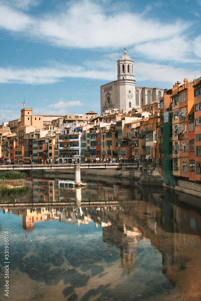Cityscape with brightly colored stone houses of the old Quarter (Barri Vell) Cityscape with brightly colored stone houses of the old Quarter (Barri Vell)