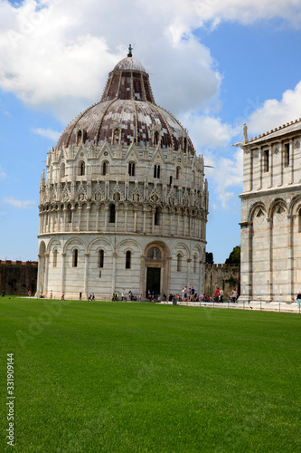 Pisa  PI   Italy - June 10  2017  The   Piazza dei Miracoli   and Baptistery  Pisa  Tuscany  Italy  Europe