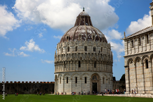 Pisa (PI), Italy - June 10, 2017: The " Piazza dei Miracoli " and Baptistery, Pisa, Tuscany, Italy, Europe