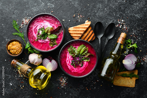 Red beet soup with sour cream. Ukrainian cuisine, Borsch soup. Top view. Free space for your text. Rustic style. photo