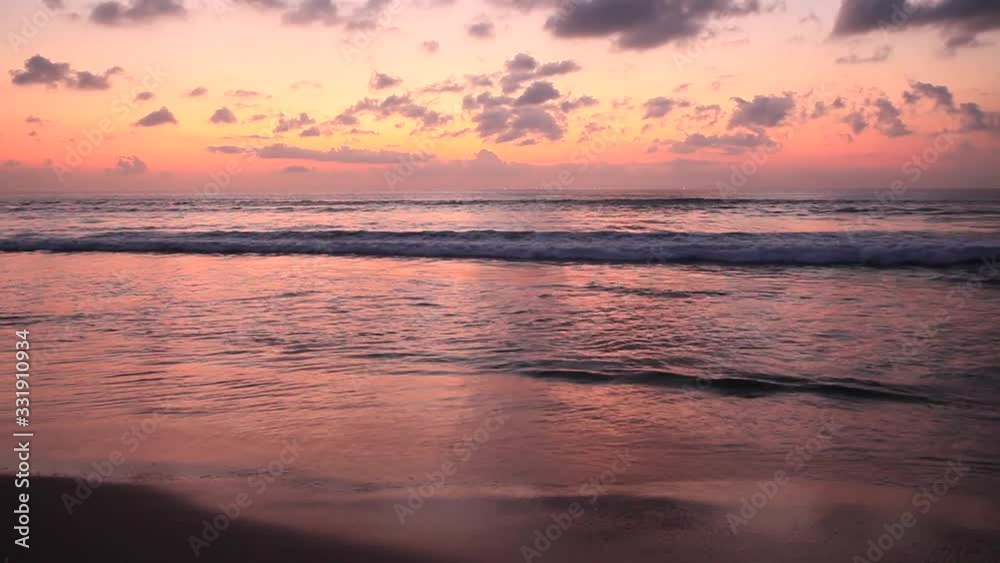 Picturesque sunset in Kuta beach, Bali, Indonesia Picturesque sunset in Kuta beach, Bali, Indonesia