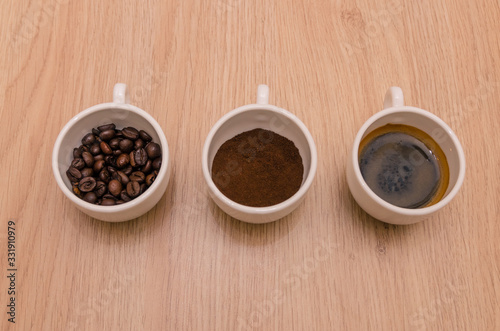 Three types of coffee - ground, grain, beverage 