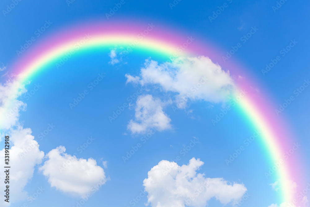 Blue sky and clouds with rainbow Blue sky and clouds with rainbow