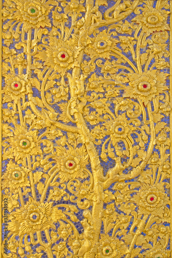 Closeup Golden carve on door, Temple in Thailand Closeup Golden carve on door, Temple in Thailand