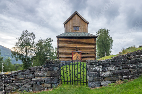 wooden church and cemetery in Ringebu in Norway photo