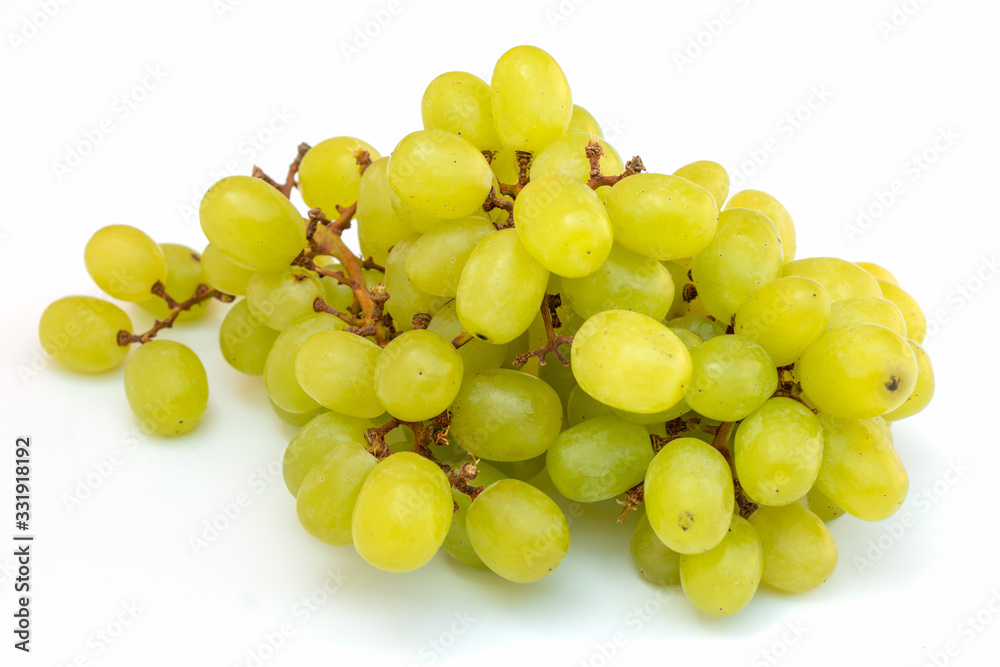 Bunch of fresh ripe juicy grapes isolated on white background.