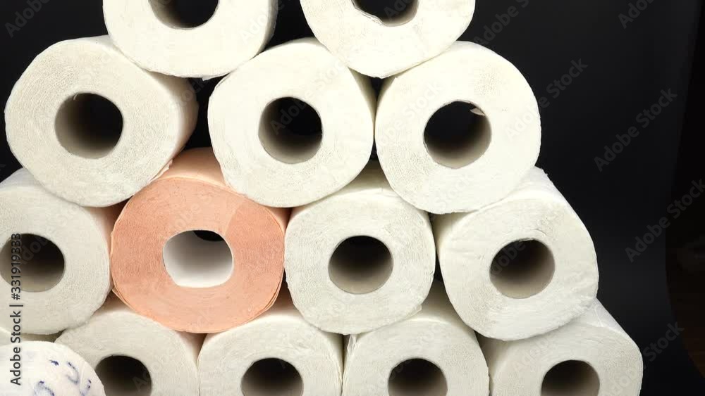 Rolls of white and pink toilet paper with text Rolls of white and pink toilet paper with text