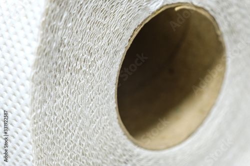 white Toilet paper layers fabricated from recycled paper close up macro shot